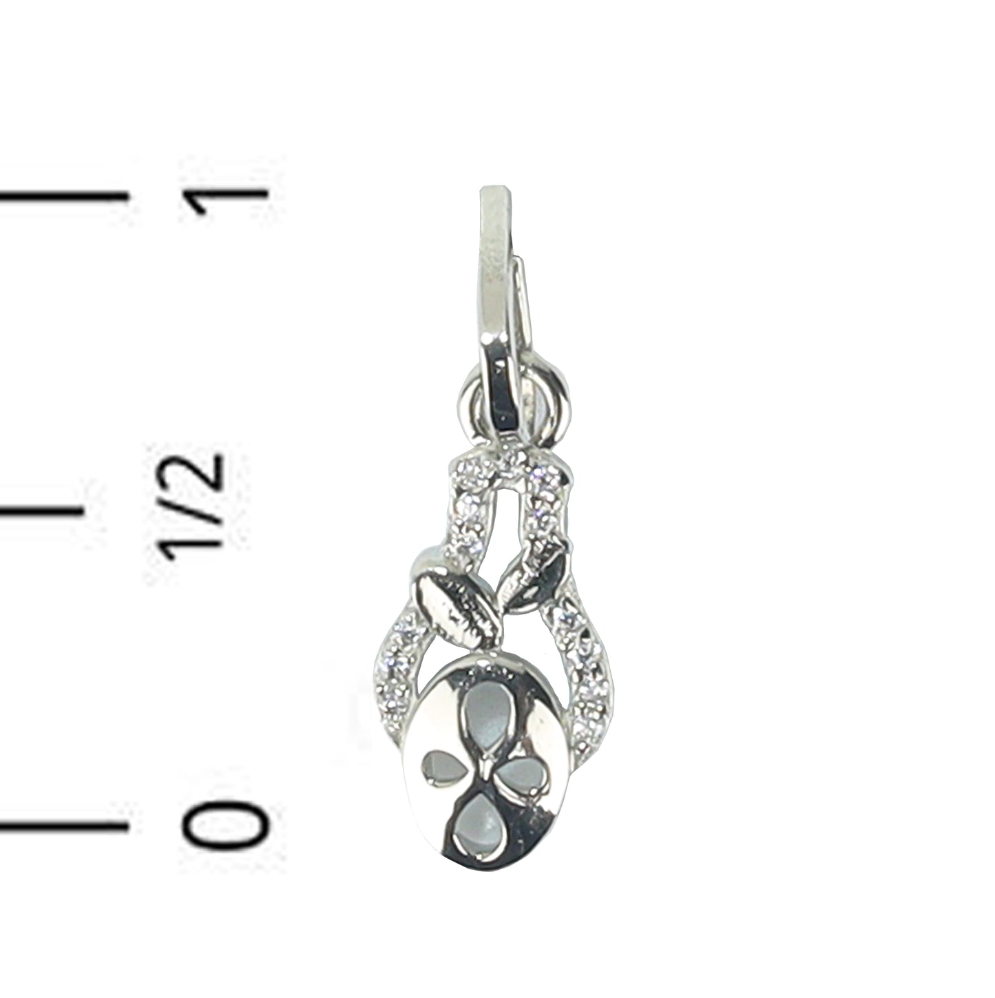 Silver pendant with floral design on a white background