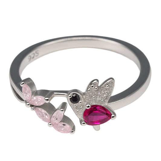 Silver ring with pink gemstones and a red gemstone on a white background